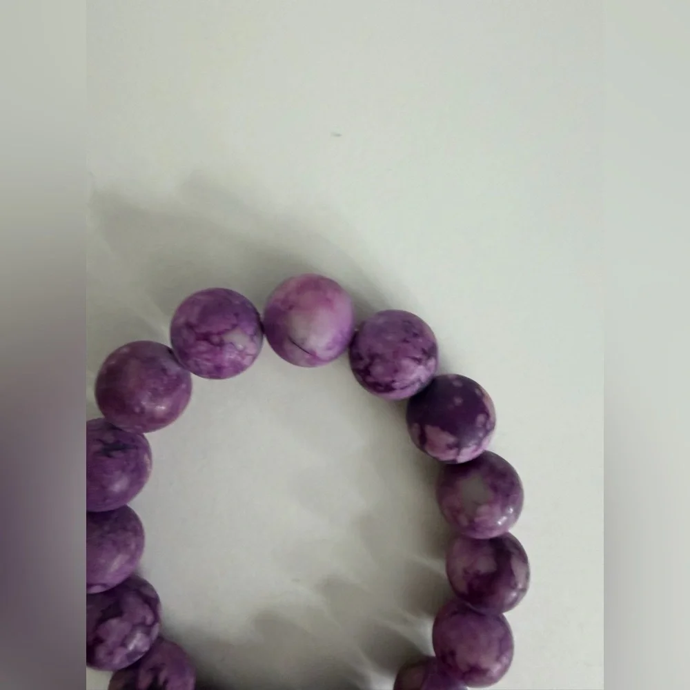 Purple Beaded Bracelet with Feather Charm